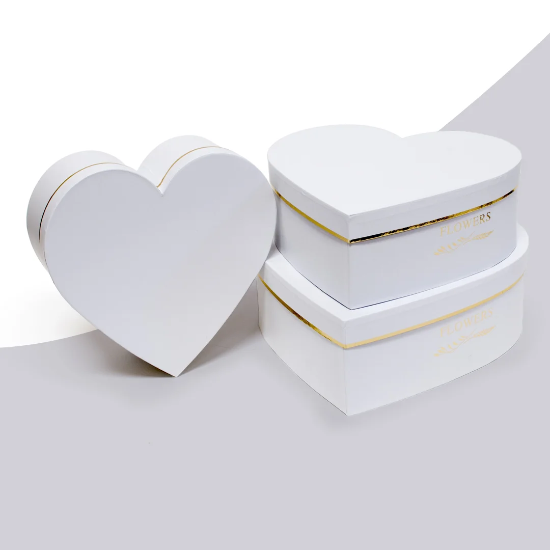 white heart shaped cardboard gift box